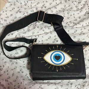 Black Crossbody Bag with Eye Design